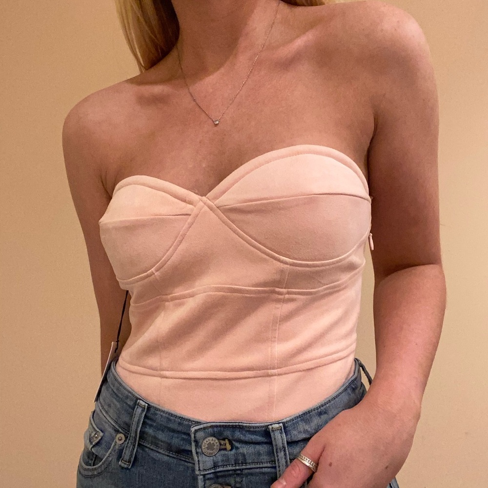 Light pink body suit